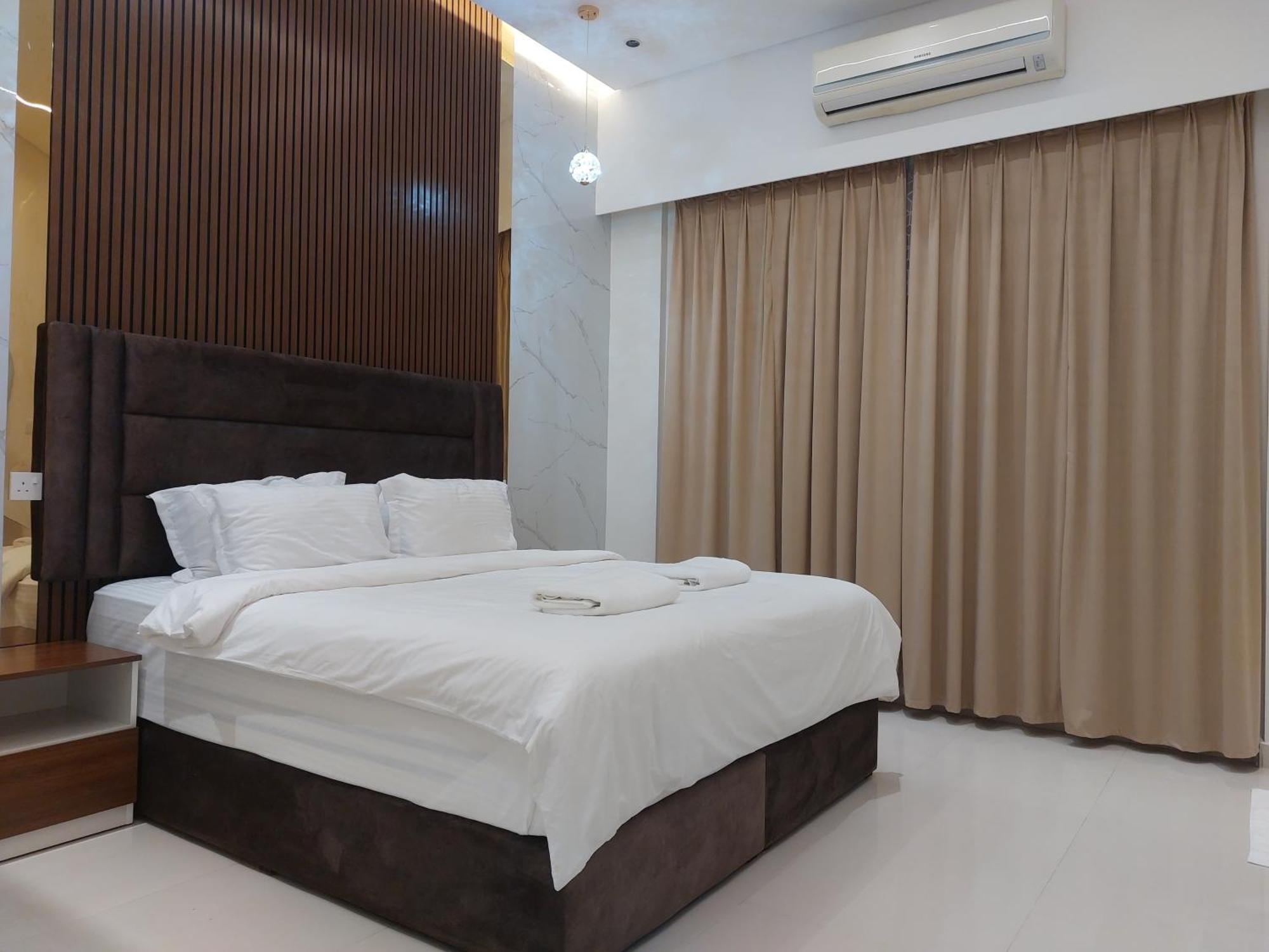 Mabahj Garnatha Hotel Apartments Сухар Экстерьер фото