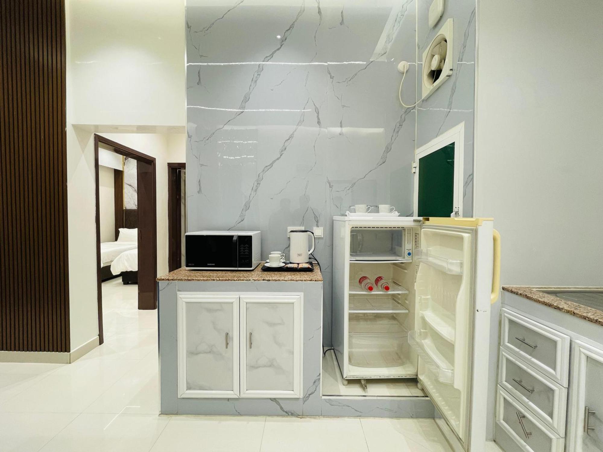 Mabahj Garnatha Hotel Apartments Сухар Номер фото